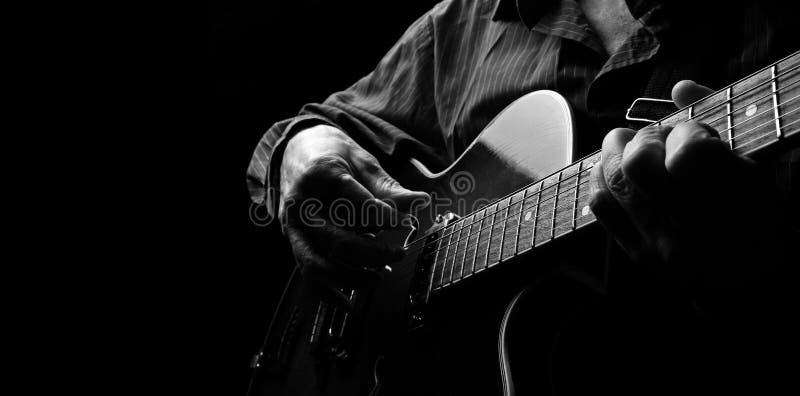 Guitarist hands and guitar close up. playing electric guitar. play the guitar. copy spaces.