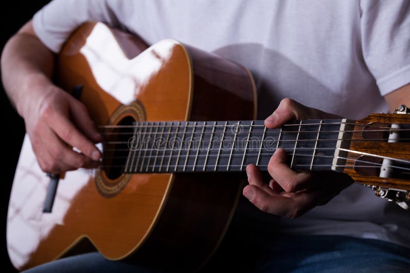 Playing Classical Guitar stock photo. Image of musical 36433348