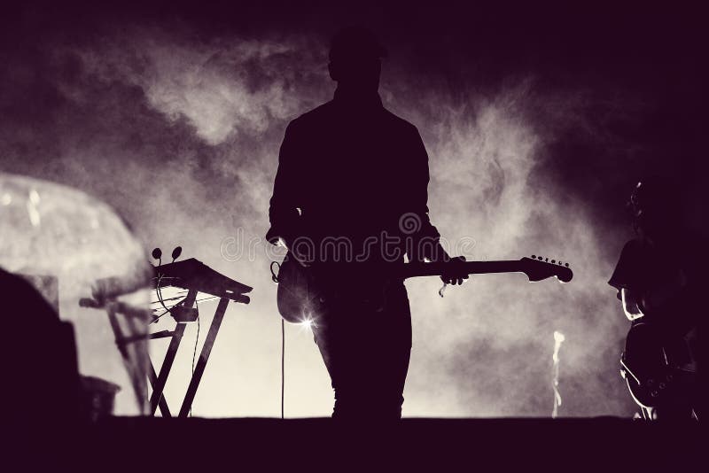 Guitarist Playing Live in Stage Lights Stock Photo Image of people