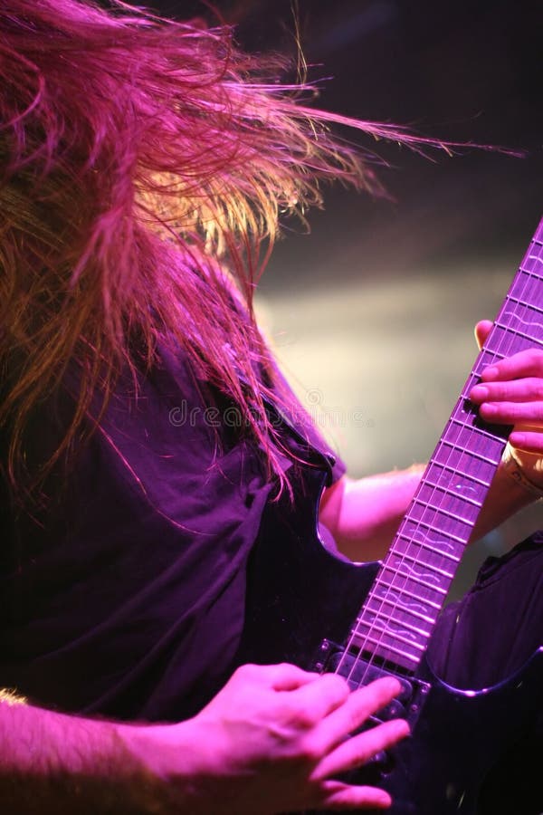 Guitarist in blue editorial photography. Image of male 14417757