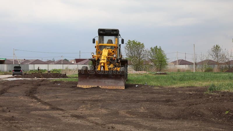 Gul bulldozer med hink. hjulladdare. gul frontladdare. tung utrustningsmaskin. framlastare för traktor