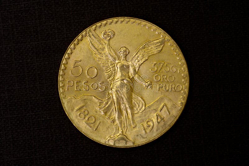 Guld- mynt från Mexico royaltyfri fotografi