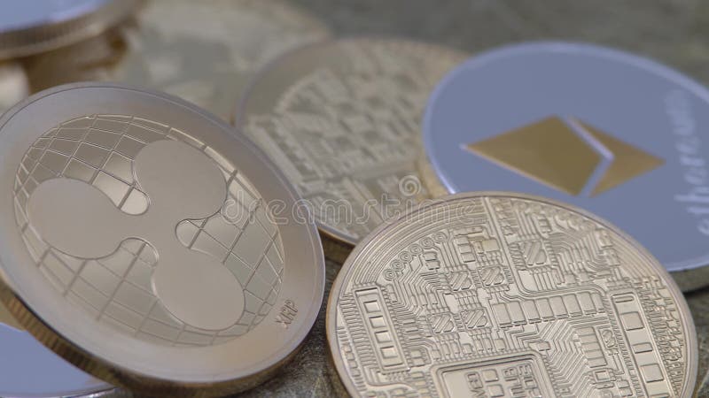 guld- Ripplecoin för fysisk metall som 4K valuta roterar över andra mynt XRP-Dan