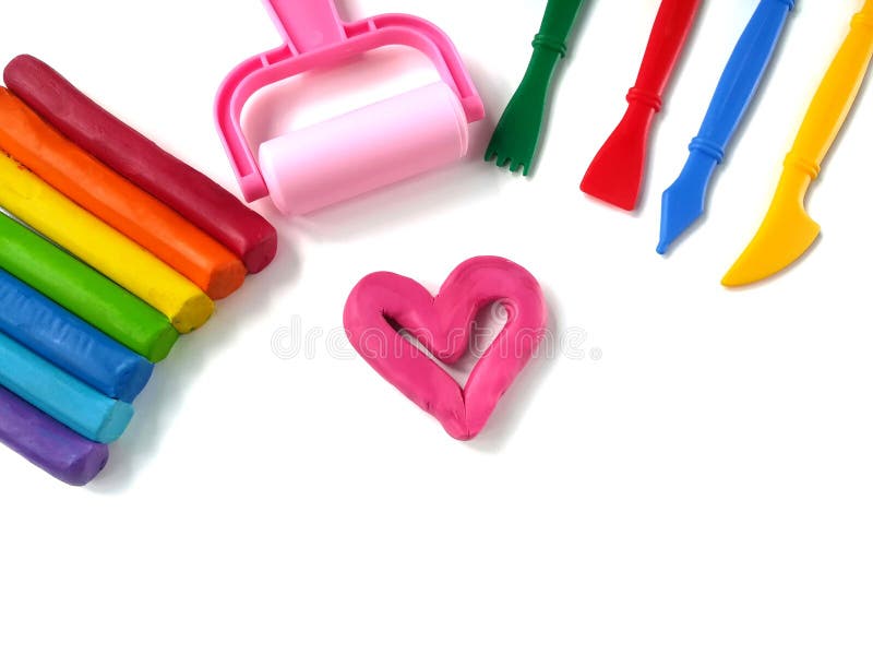 Gullig rosa hjärtaplasticinelera, färgrik pinnedeg, variation som spelar utrustning royaltyfri fotografi Gullig rosa hjärtaplasticinelera, färgrik pinnedeg, variation som spelar utrustning royaltyfri fotografi