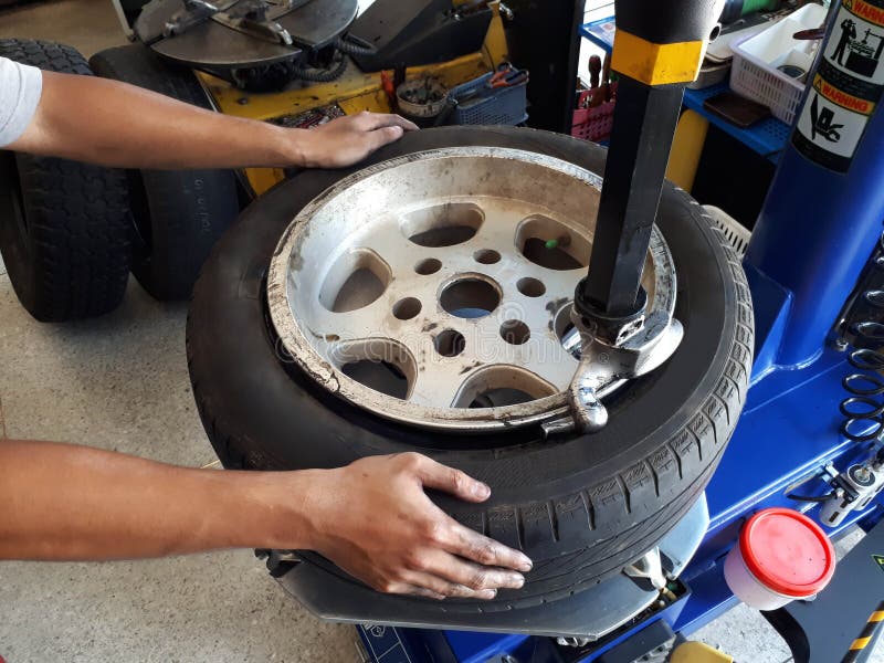 Tire changer in a car service center. Tire changer in a car service center