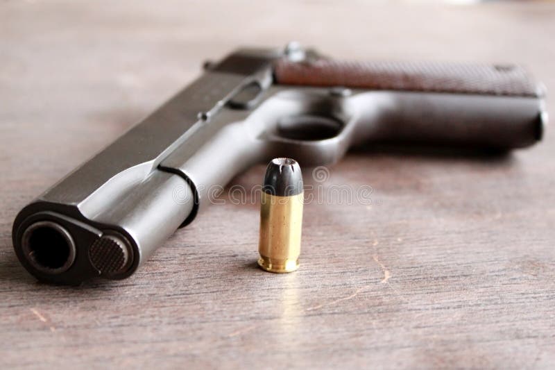 Gun and bullet stock photo. Image of bullet, black, defense 16010040