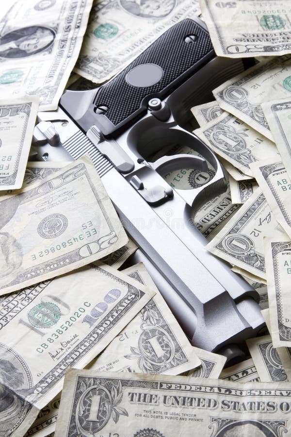 Gun and money stock photo. Image of dollar, weapon, criminal 9382198
