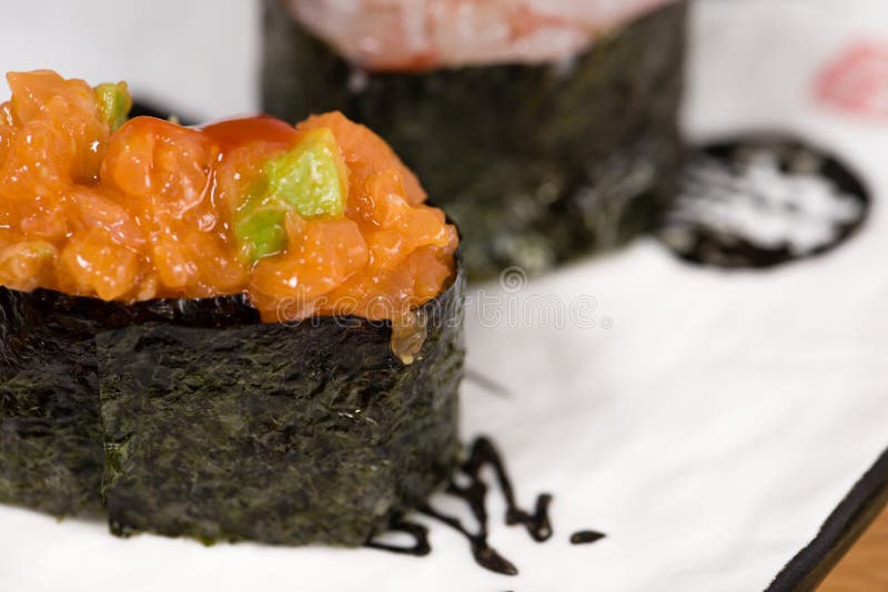 Gunkan with Salmon and Avocado Tartare Wrapped in Nori Seaweed Stock