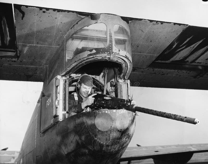 Gunner firing from plane stock image. Image of bygone - 52001409