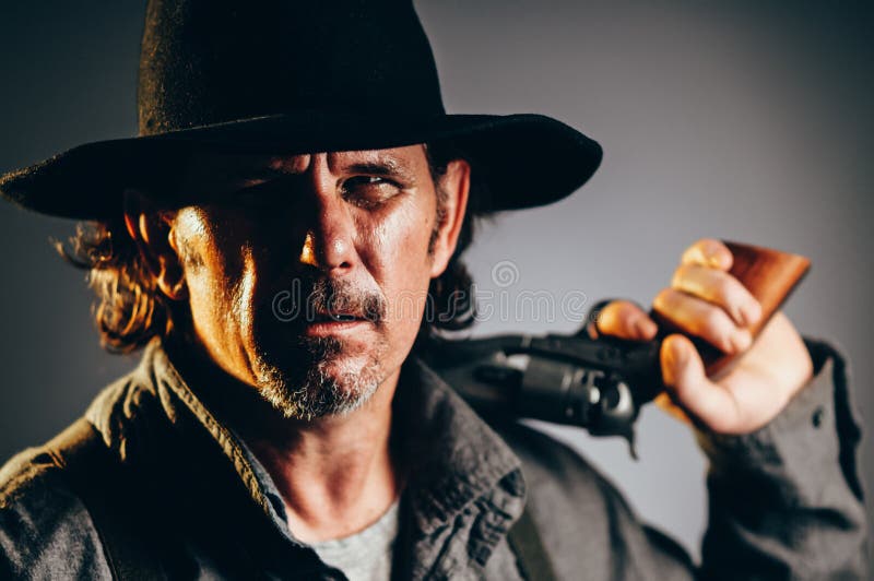 Gunslinger ocidental selvagem imagem de stock Gunslinger ocidental selvagem imagem de stock
