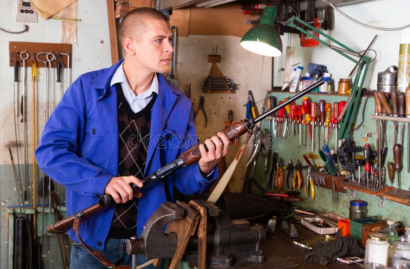 Gunsmith Examines and Checks Appearance of the Semi Automatic Rifle