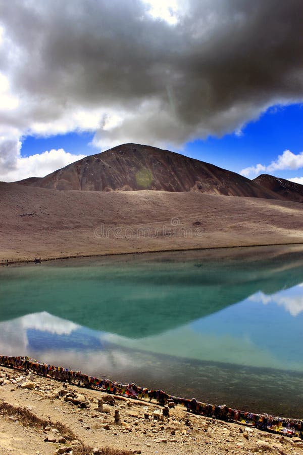 Gurudongmar Lake Buddhist Flag flutters in GuruDongmar Lake.JPG Buddhist Holy Lake -Gurudongmar Lake Location	North Sikkim, India Coordinates	28.02°N 88.71°ECoordinates: 28.02°N 88.71°E Basin countries	Sikkim, India Surface area	118 hectares 290 acres Shore length1	5.34 kilometres 3.32 mi Surface elevation	17,004 ft 5,183 m Settlements Mangan, North Sikkim 122 km. Lachen, North Sikkim 67 km. 1 Shore length is not a well-defined measure. Gurudongmar in May. Gurudongmar Lake in Sikkim. Gurudongmar Lake is one of the highest lakes in the world and in India, located at an altitude of 17,800 ft 5,430 m in the Indian state of Sikkim. Gurudongmar Lake Buddhist Flag flutters in GuruDongmar Lake.JPG Buddhist Holy Lake -Gurudongmar Lake Location	North Sikkim, India Coordinates	28.02°N 88.71°ECoordinates: 28.02°N 88.71°E Basin countries	Sikkim, India Surface area	118 hectares 290 acres Shore length1	5.34 kilometres 3.32 mi Surface elevation	17,004 ft 5,183 m Settlements Mangan, North Sikkim 122 km. Lachen, North Sikkim 67 km. 1 Shore length is not a well-defined measure. Gurudongmar in May. Gurudongmar Lake in Sikkim. Gurudongmar Lake is one of the highest lakes in the world and in India, located at an altitude of 17,800 ft 5,430 m in the Indian state of Sikkim.