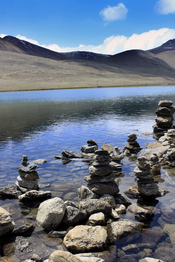 Gurudongmar Lake Buddhist Flag flutters in GuruDongmar Lake.JPG Buddhist Holy Lake -Gurudongmar Lake Location	North Sikkim, India Coordinates	28.02°N 88.71°ECoordinates: 28.02°N 88.71°E Basin countries	Sikkim, India Surface area	118 hectares 290 acres Shore length1	5.34 kilometres 3.32 mi Surface elevation	17,004 ft 5,183 m Settlements Mangan, North Sikkim 122 km. Lachen, North Sikkim 67 km. 1 Shore length is not a well-defined measure. Gurudongmar in May. Gurudongmar Lake in Sikkim. Gurudongmar Lake is one of the highest lakes in the world and in India, located at an altitude of 17,800 ft 5,430 m in the Indian state of Sikkim. Gurudongmar Lake Buddhist Flag flutters in GuruDongmar Lake.JPG Buddhist Holy Lake -Gurudongmar Lake Location	North Sikkim, India Coordinates	28.02°N 88.71°ECoordinates: 28.02°N 88.71°E Basin countries	Sikkim, India Surface area	118 hectares 290 acres Shore length1	5.34 kilometres 3.32 mi Surface elevation	17,004 ft 5,183 m Settlements Mangan, North Sikkim 122 km. Lachen, North Sikkim 67 km. 1 Shore length is not a well-defined measure. Gurudongmar in May. Gurudongmar Lake in Sikkim. Gurudongmar Lake is one of the highest lakes in the world and in India, located at an altitude of 17,800 ft 5,430 m in the Indian state of Sikkim.