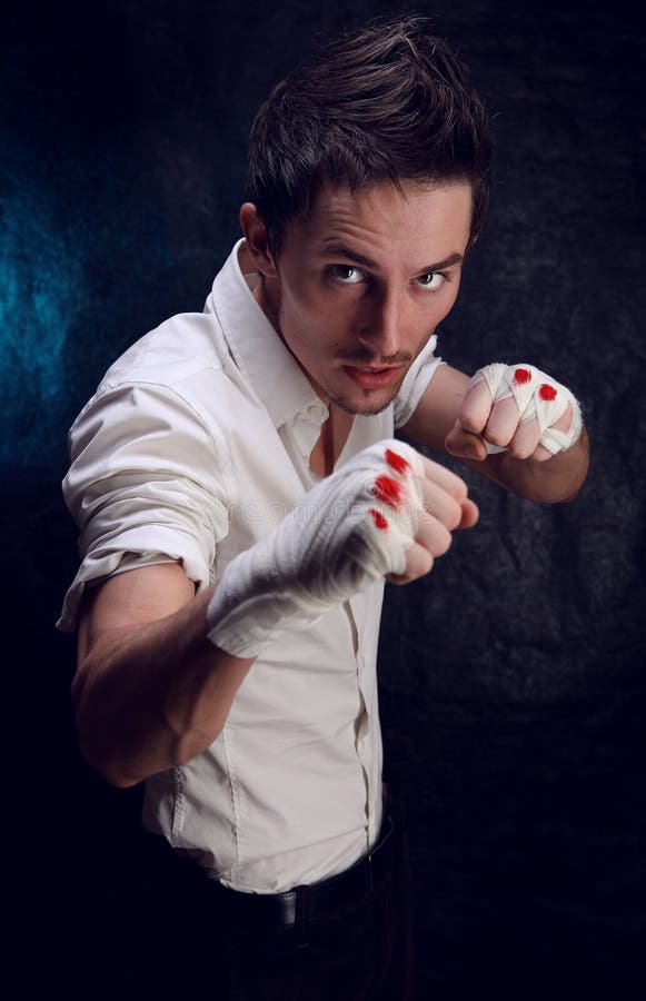 Guy with bandaged hands stock photography