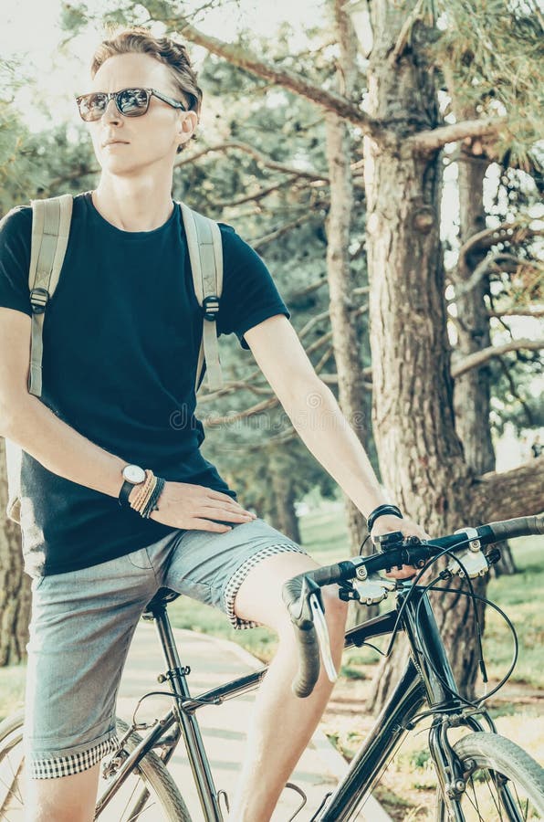 Guy with bike outdoor. stock image. Image of people - Guy Bike OutDoor Young Man Walking Summer Park 120366041