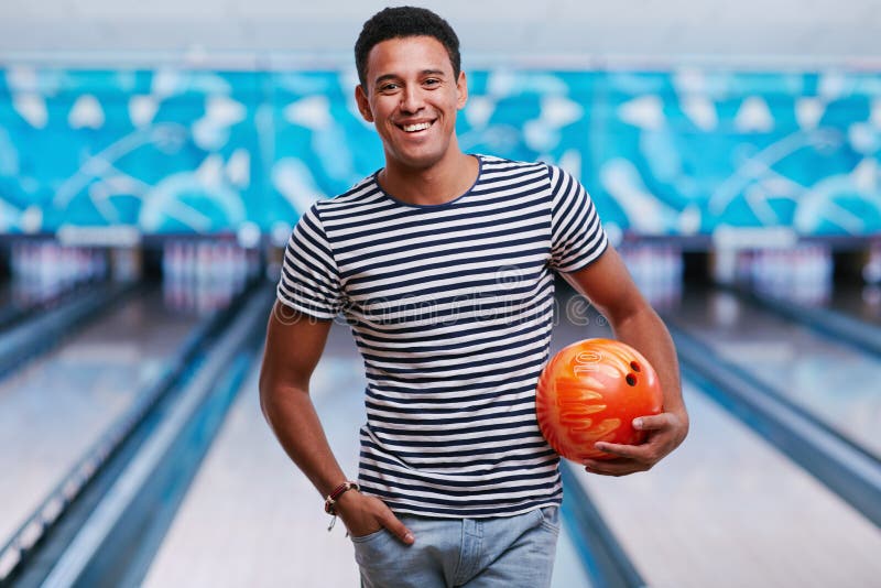 Guy with bowling ball stock image. Image of looking, activity 61744673