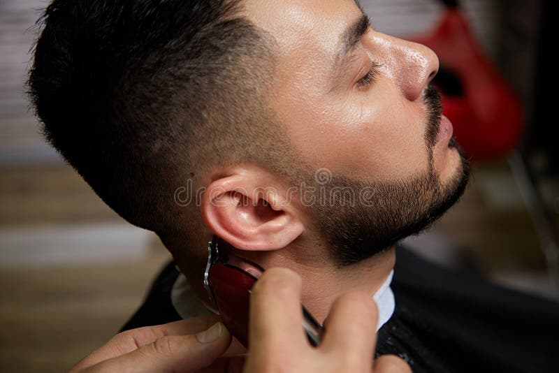 The Guy is a Dark-haired Asian Indian Appearance on a Haircut in a  Barbershop . Cinematic Image Stock Image - Image of salon, fashion:  175720999