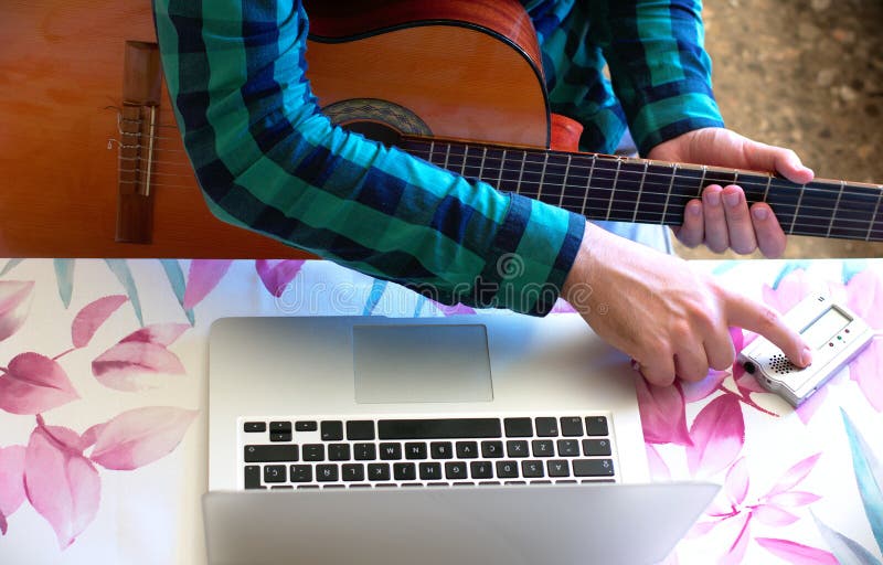 Guy Driving the Tuner during Online Guitar Lessons at Home Stock Image