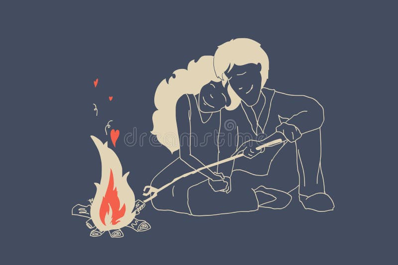 Guy and girl in love sitting near fire at night