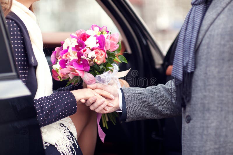 The Guy Gives Girl A Flowers Stock Image Image of young, happy 38128653