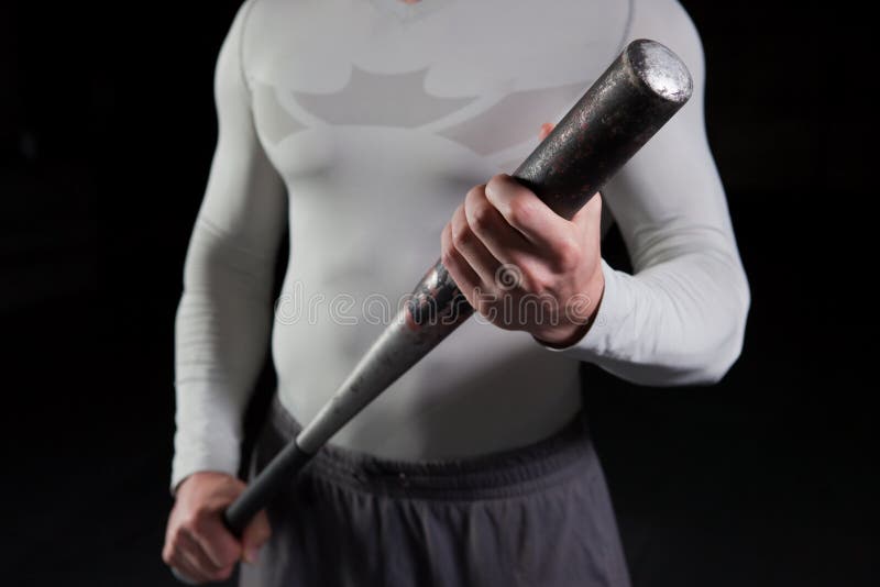 Guy holding a baseball bat stock image. Image of muscle 14676457