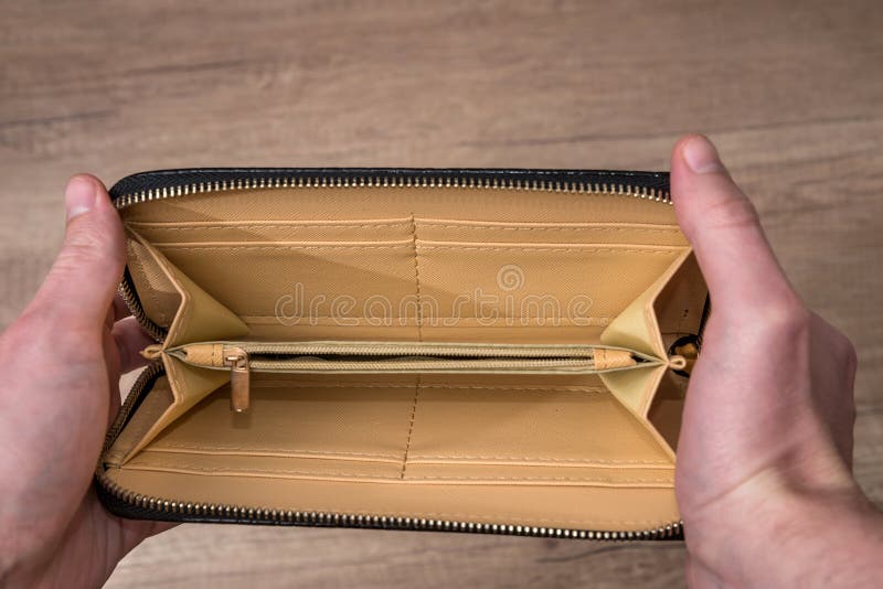 Guy holding empty purse stock image. Image of credit 108040225