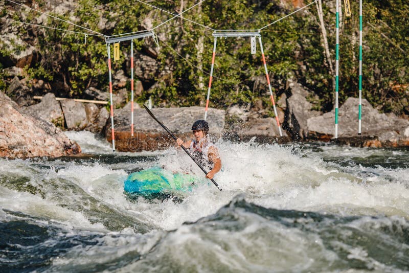 Guy in Kayak Sails Mountain River. Whitewater Kayaking, Extreme Sport Rafting Stock Image