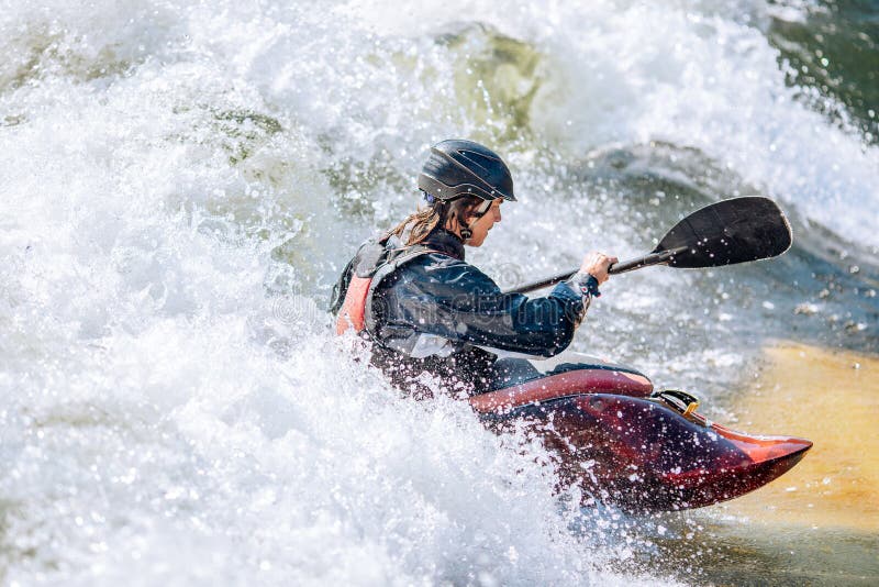 Guy in Kayak Sails Mountain River. Whitewater Kayaking, Extreme Sport Rafting Stock Image
