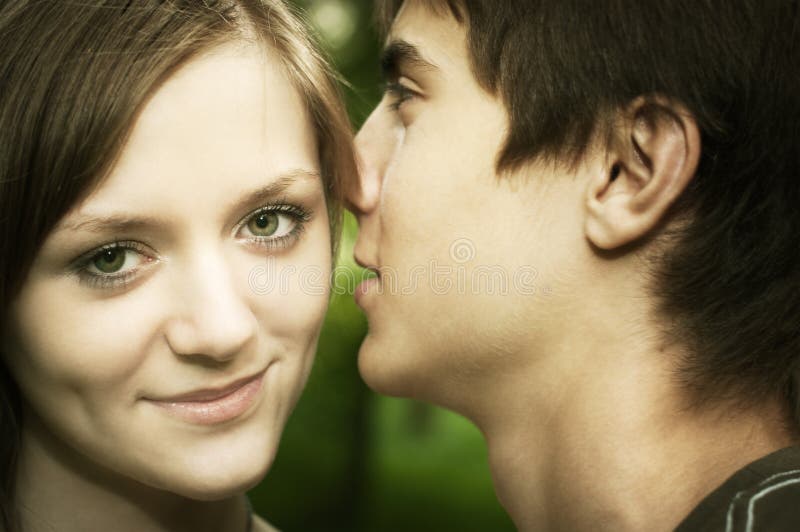 Guy kisses the girl