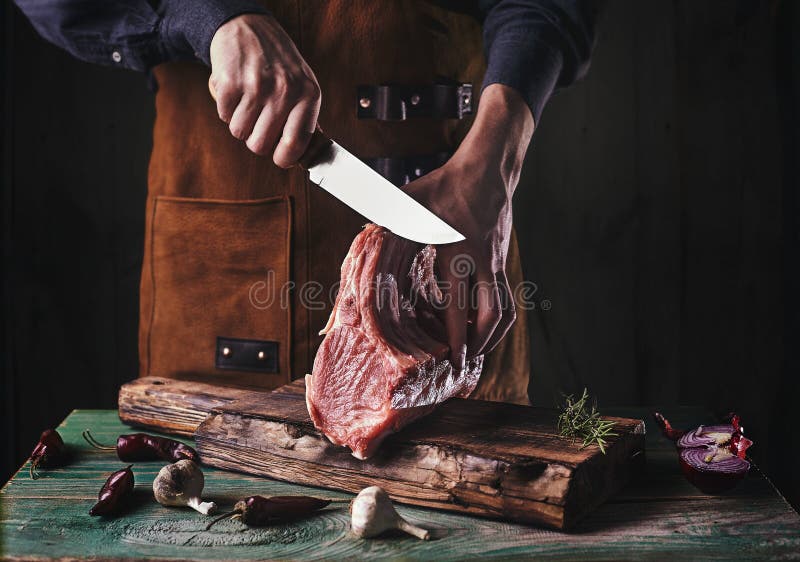 https://thumbs.dreamstime.com/b/guy-leather-apron-slicing-raw-meat-butcher-cuts-pork-ribs-meat-bone-wooden-cutting-board-guy-225512582.jpg