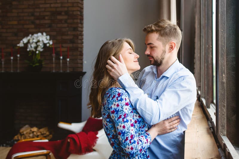 The boy looks tenderly at girl and wants to kiss. Concept of teenage love  and first kiss 7542624 Stock Photo at Vecteezy