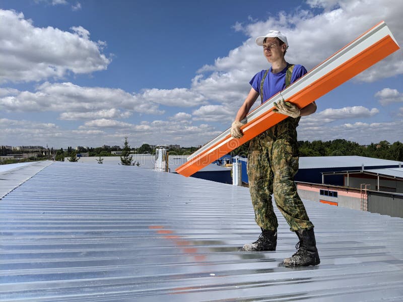 5,350 Construction Guy Roof Stock Photos Free & RoyaltyFree Stock