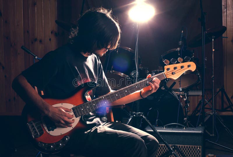 849 Boy Playing Bass Guitar Stock Photos Free & RoyaltyFree Stock
