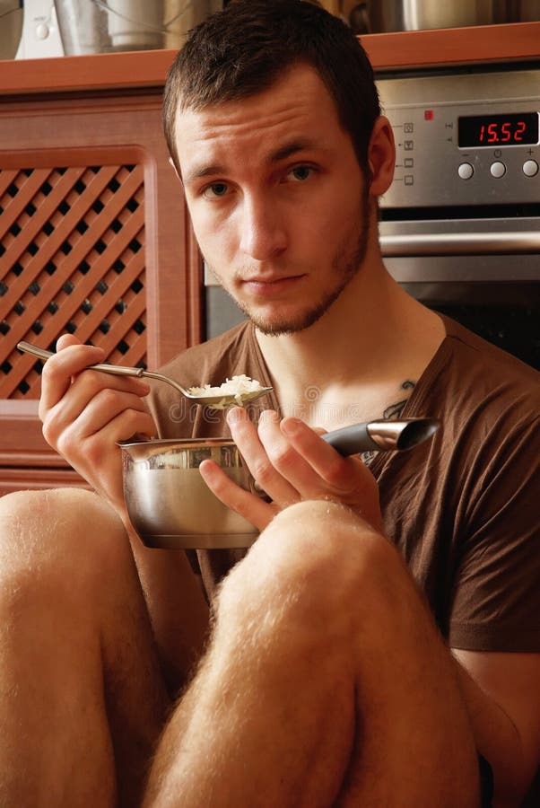 Guy with pot of rice