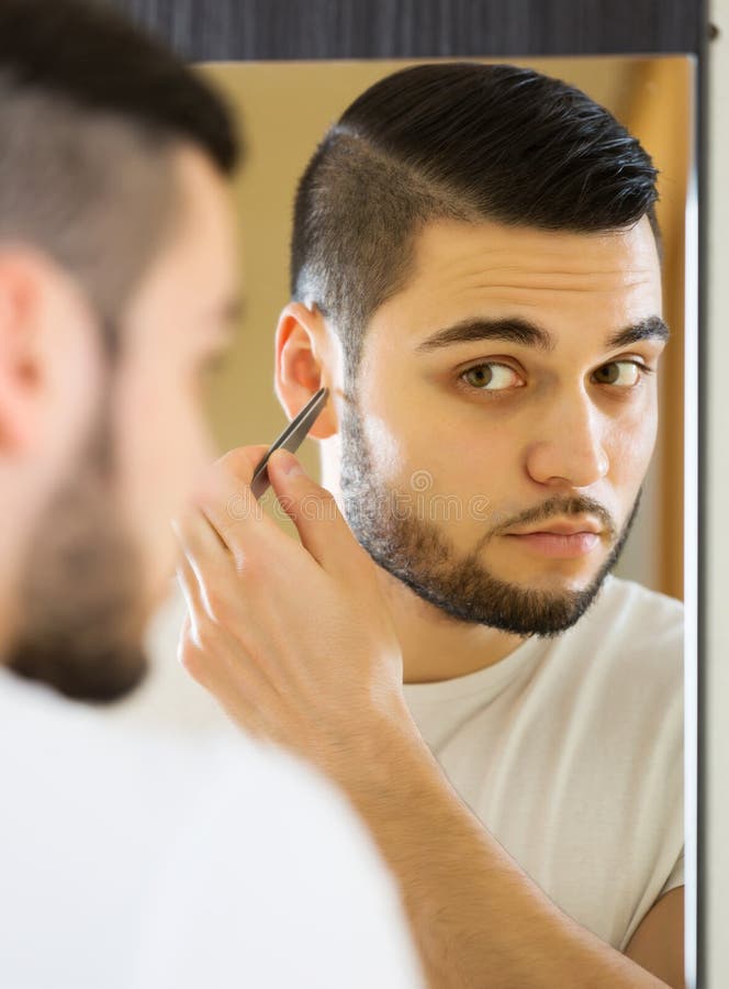 Man Removing Nose Hair Tweezers Stock Photos Free & RoyaltyFree