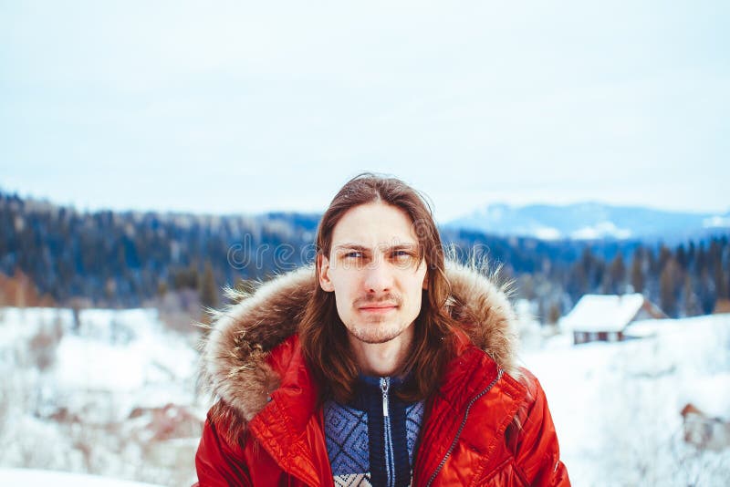 The guy sitting in the snow stock images