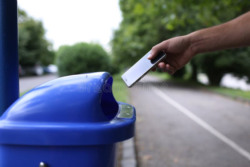 A Man Throws Phone In Toilet Stock Photo Image of down, away 65146012