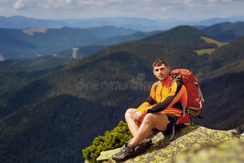 Guy with a Travel Backpack on the Top of a Boulder Stock Image Image