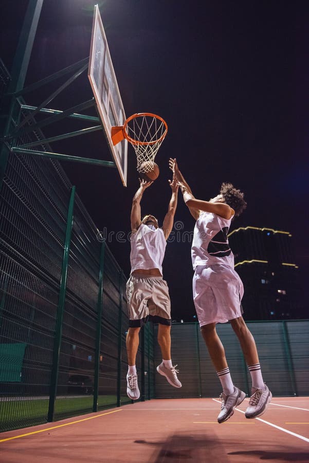 Guys playing basketball stock photo. Image of court - 302179668