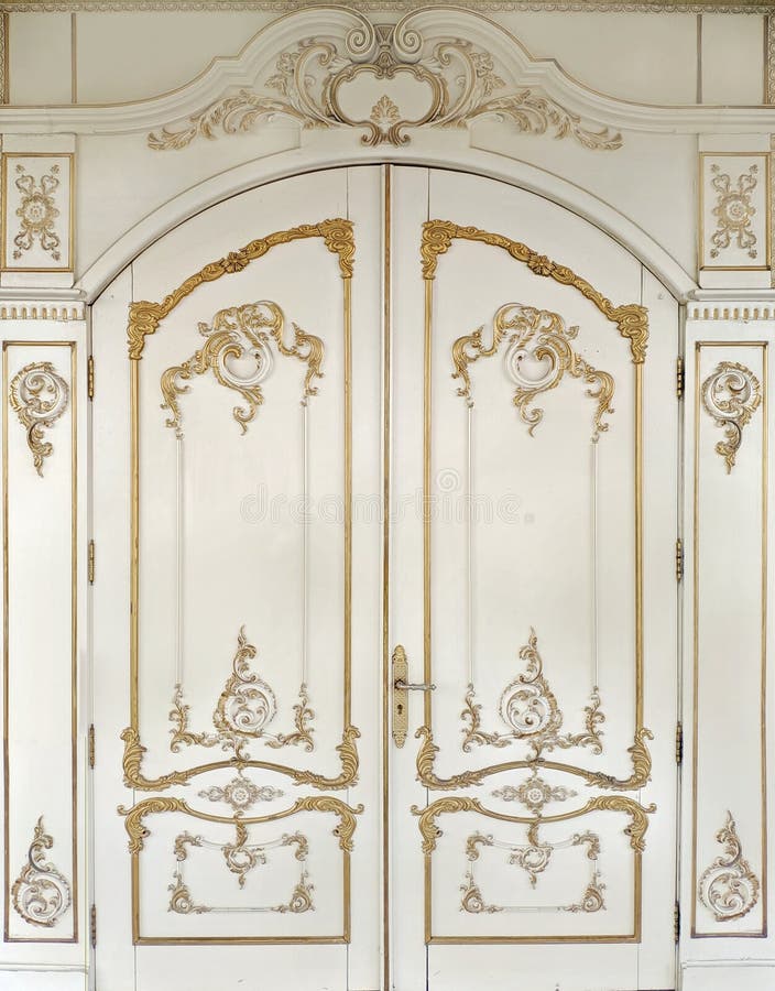 3d illustration. Carved gilded door in Baroque style. Joinery in the interior. Background. 3d illustration. Carved gilded door in Baroque style. Joinery in the interior. Background.