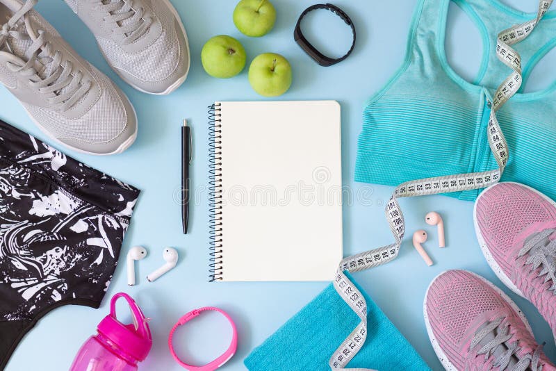 Gym Wear and Accessories for Women with Blank Notebook for Exercise Plan on  Blue Mat Stock Image - Image of blue, fashion: 191539045