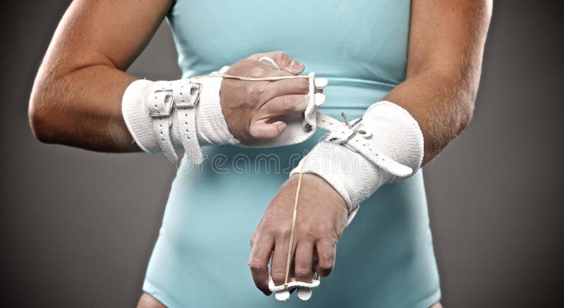 Gymnast getting grips on royalty free stock photo Gymnast getting grips on royalty free stock photo
