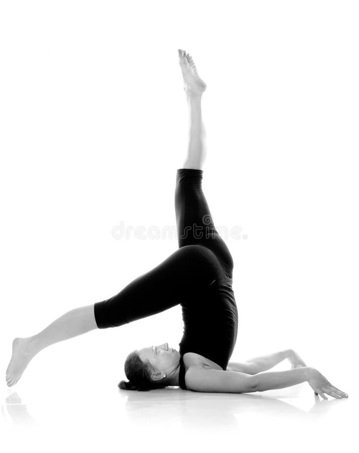 Gymnast girl on white background. Leg is up