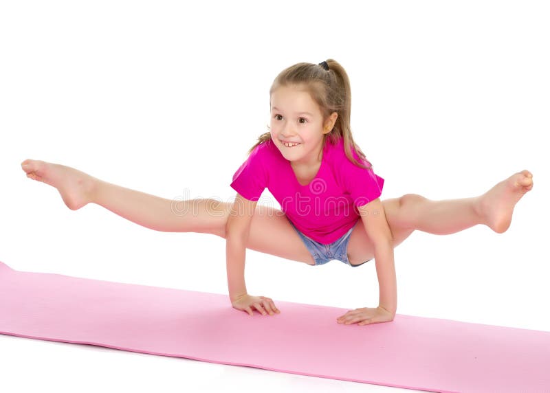 The gymnast perform an acrobatic element on the floor.