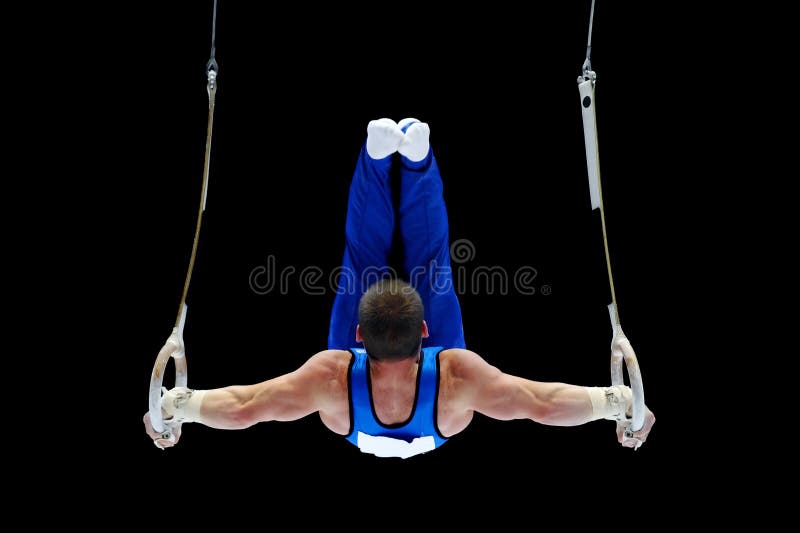 Gymnast Performing On The Rings royalty free stock images Gymnast Performing On The Rings royalty free stock images