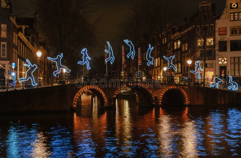 Gymnastic exercises of a light figure on a bridge