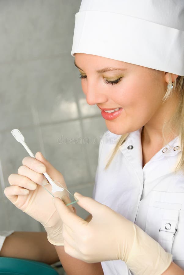 Gynecologist examining a patient