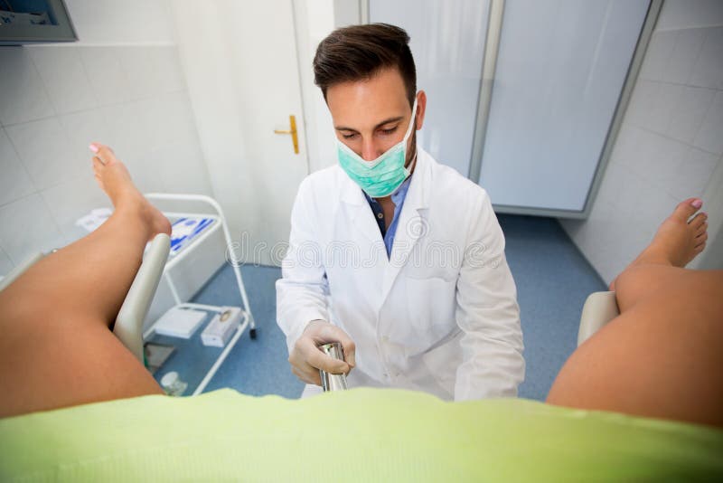 Gynecologist examining a patient royalty free stock image Gynecologist examining a patient royalty free stock image