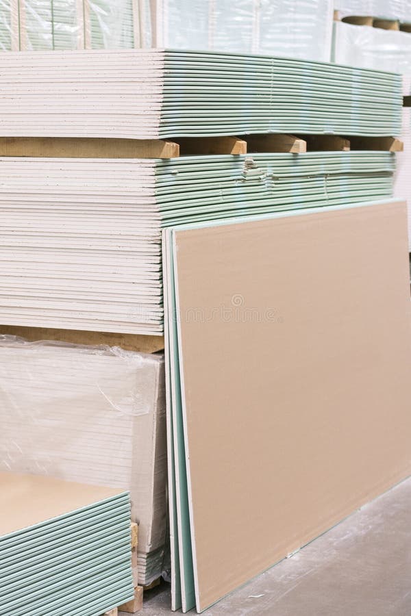 Gypsum Plasterboard in the Pack. the Stack of Gypsum Board Preparing