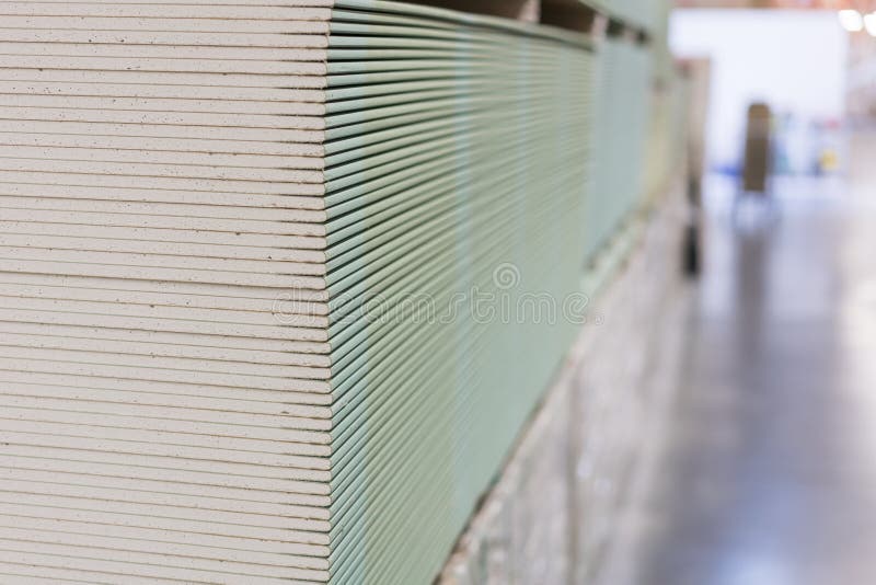 Gypsum Plasterboard in the Pack. the Stack of Gypsum Board Preparing